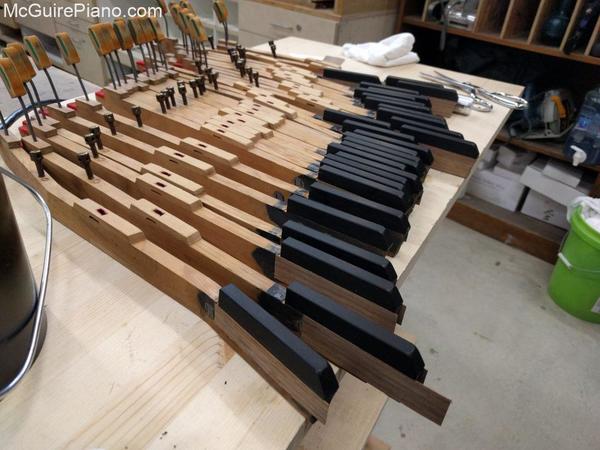 Bolstering keysticks with veneer
